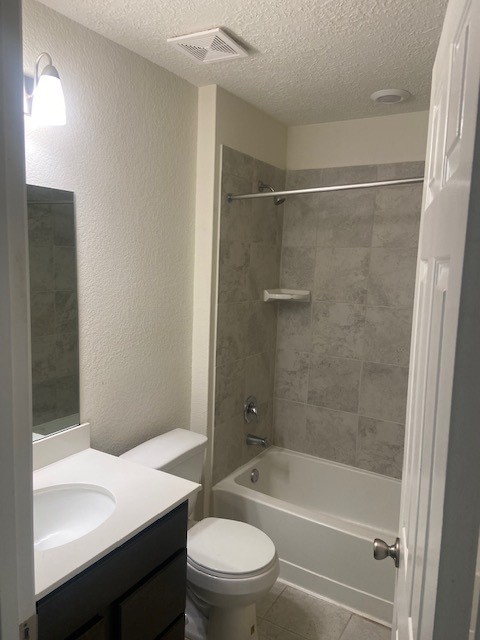 4631 Cullen Brook Road Katy, TX 77449 - Photo 10 of 15 a bathroom with a bathtub shower sink vanity and toilet
