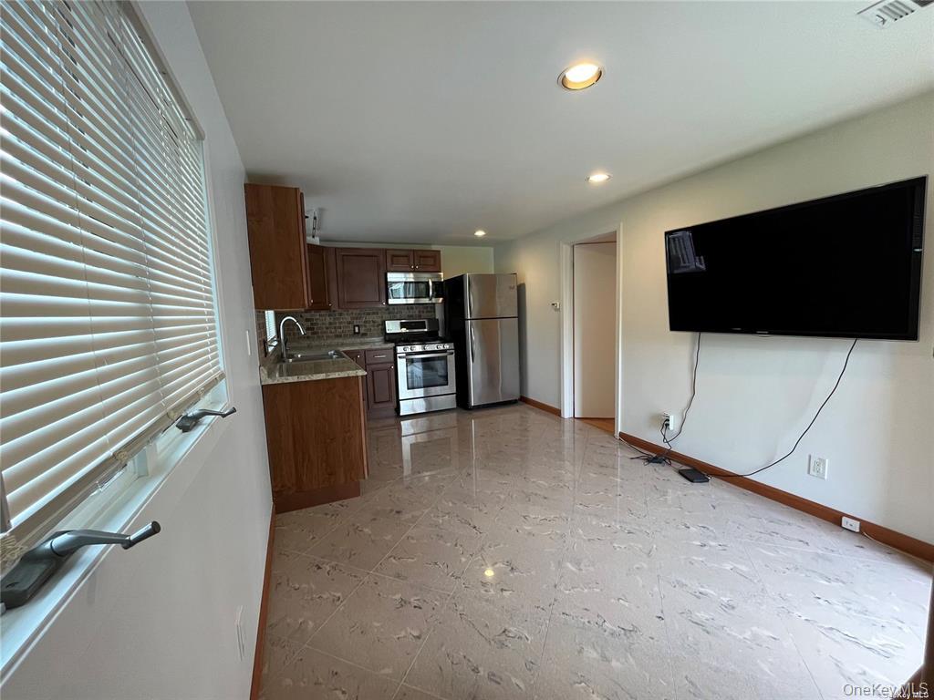 12 Reed Drive Deer Park, NY 11729 - Photo 4 of 10 Open Concept Kitchen/Family Room