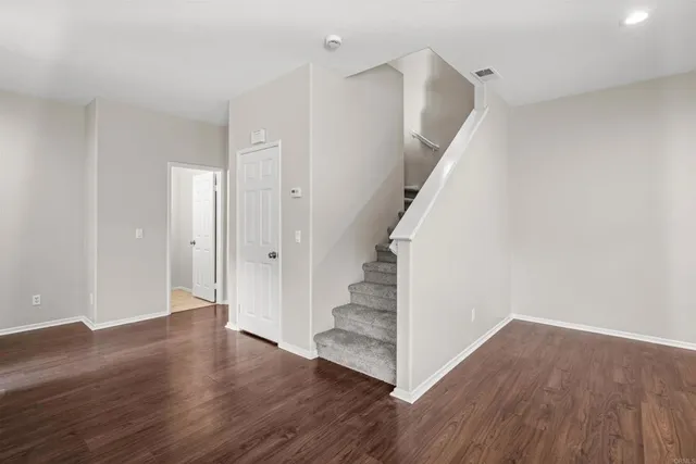 a view of entryway with wooden floor