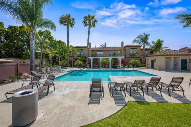 a house with palm tree in front of it