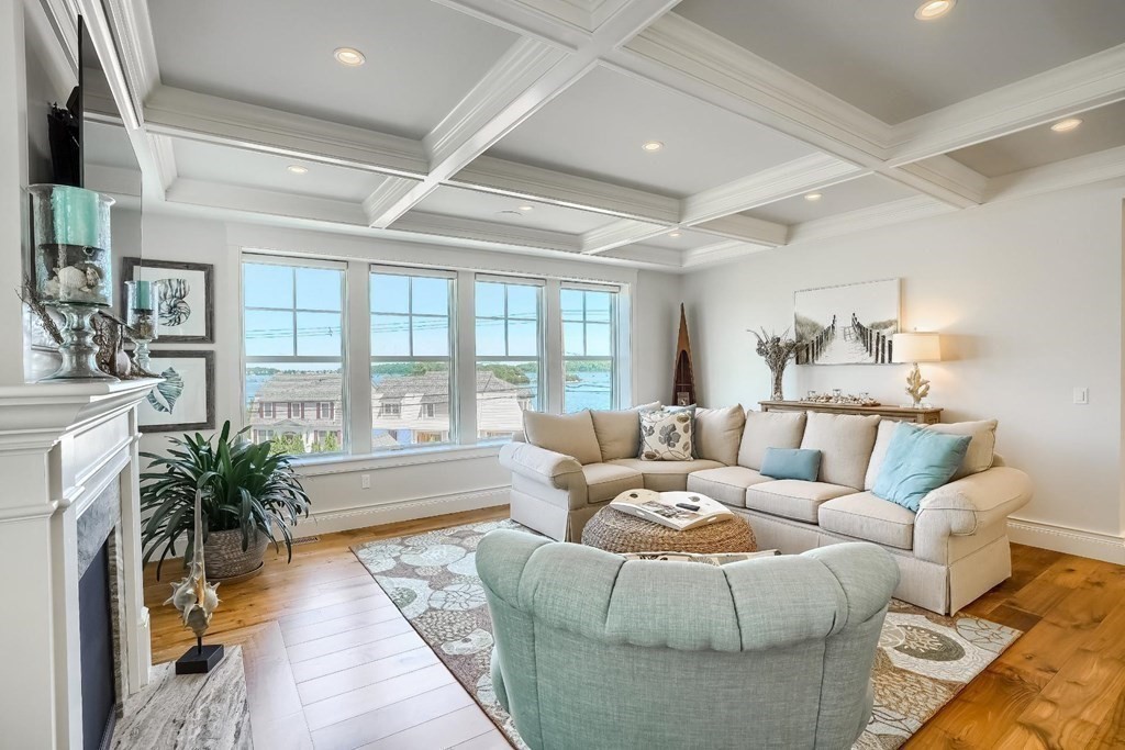 170 Otis Street Hingham, MA 02043 - Photo 17 of 24 a living room with furniture and a large window