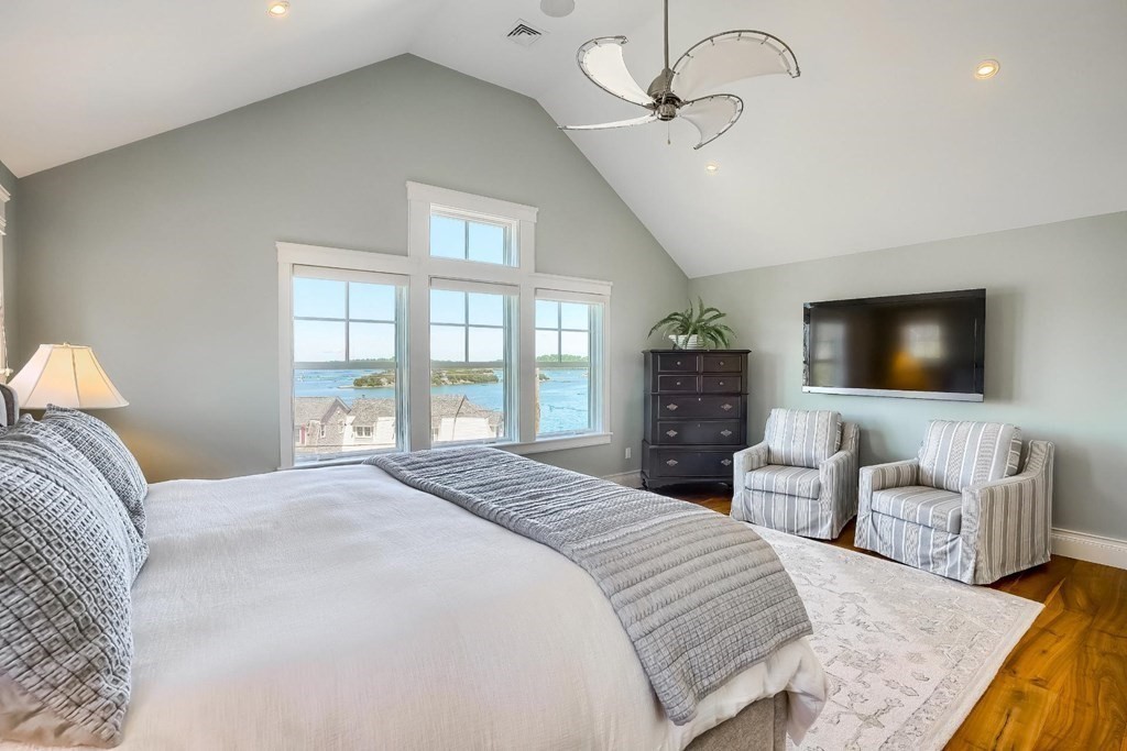 170 Otis Street Hingham, MA 02043 - Photo 18 of 24 a bedroom with a bed and a flat screen tv