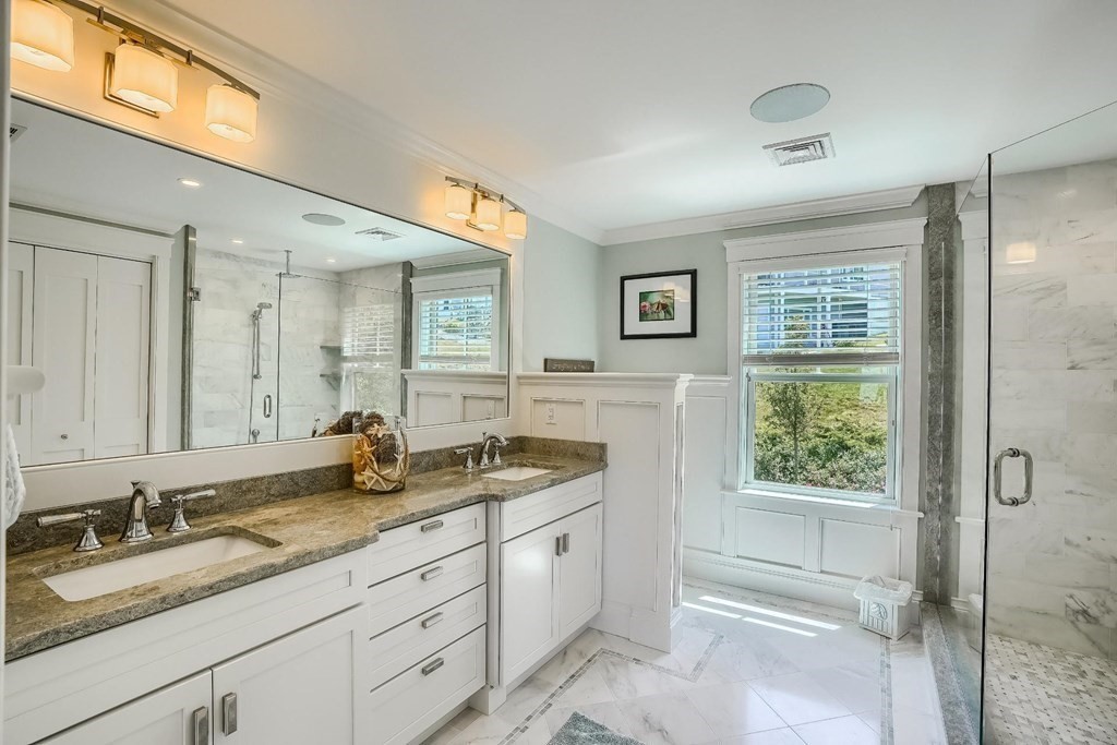 170 Otis Street Hingham, MA 02043 - Photo 19 of 24 a bathroom with a granite countertop sink mirror and window