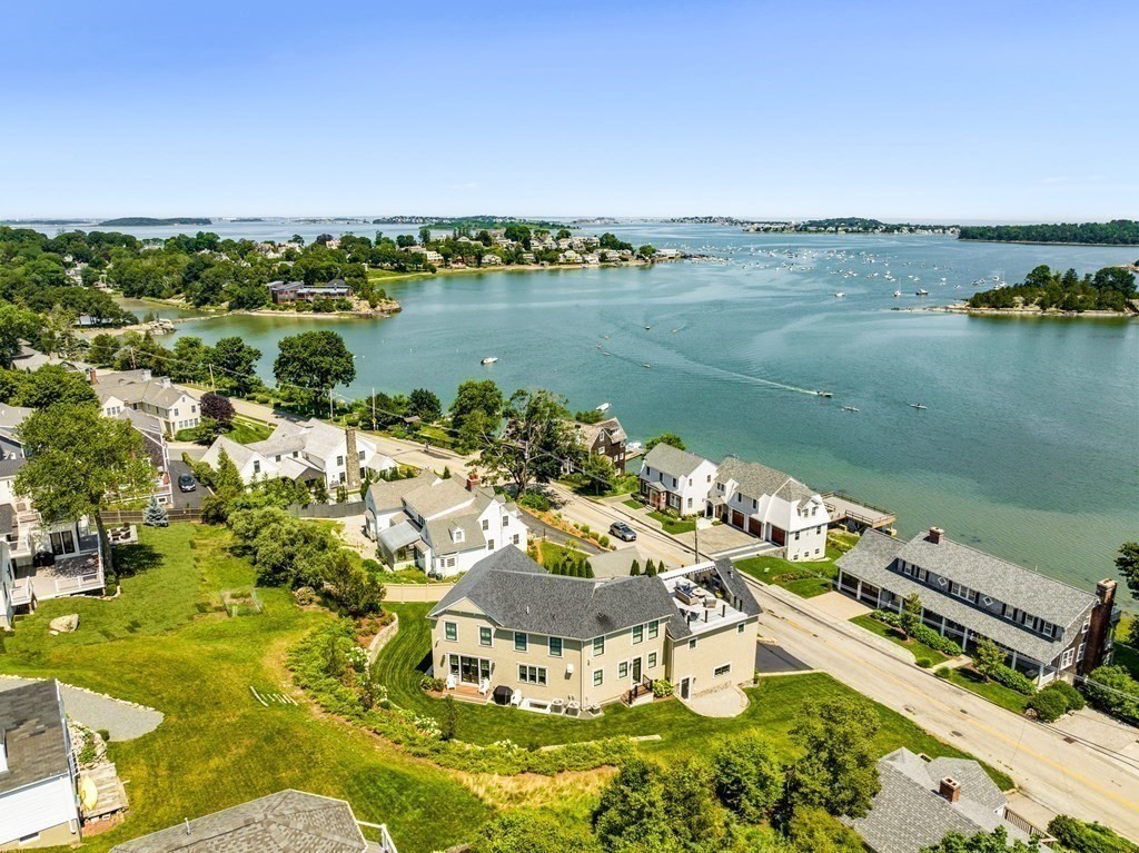 170 Otis Street Hingham, MA 02043 - Photo 2 of 24 a view of a lake with a mountain
