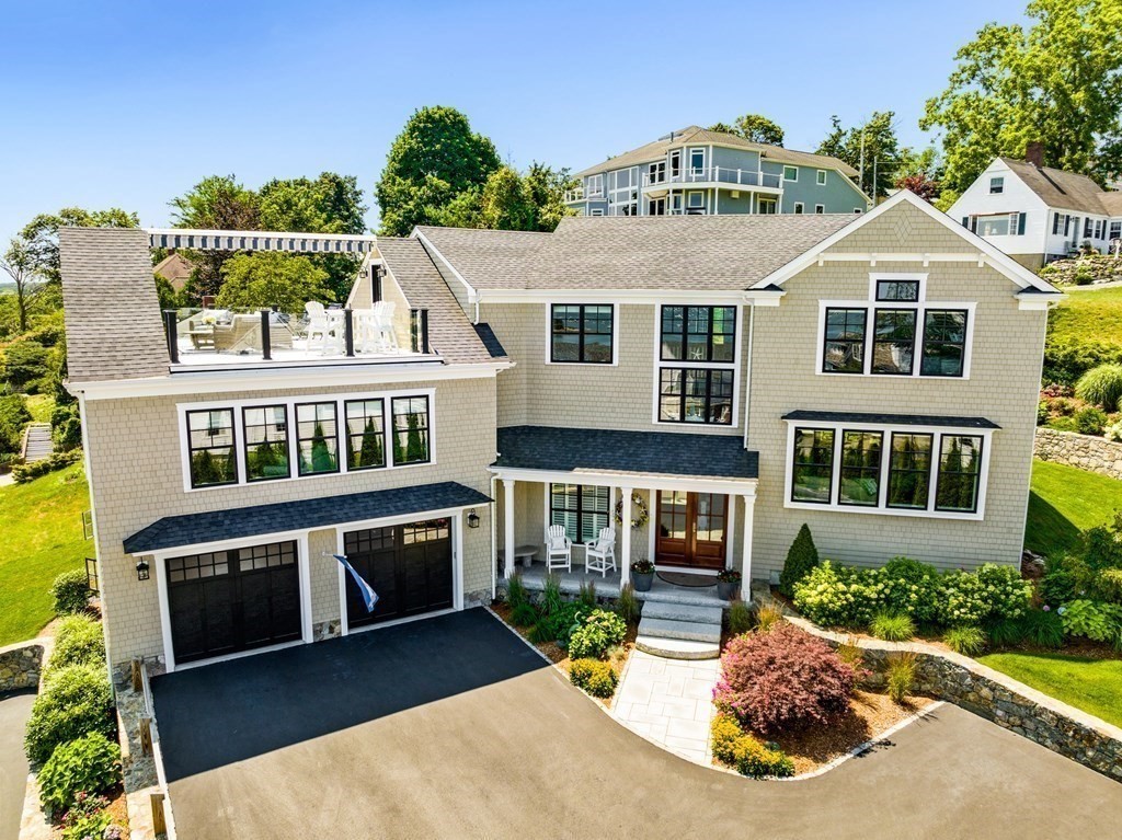 170 Otis Street Hingham, MA 02043 - Photo 24 of 24 a view of a house with a yard and potted plants