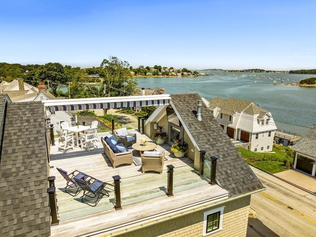 170 Otis Street Hingham, MA 02043 - Photo 4 of 24 a view of a balcony with chairs