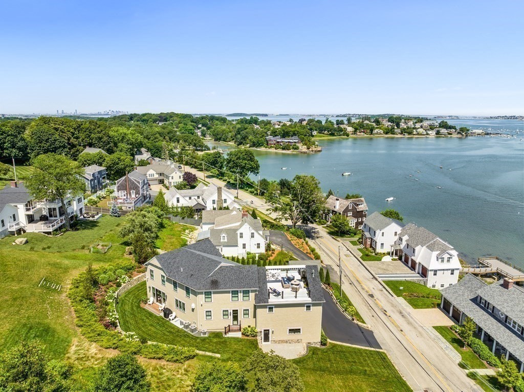 170 Otis Street Hingham, MA 02043 - Photo 7 of 24 an aerial view of a city with lake view