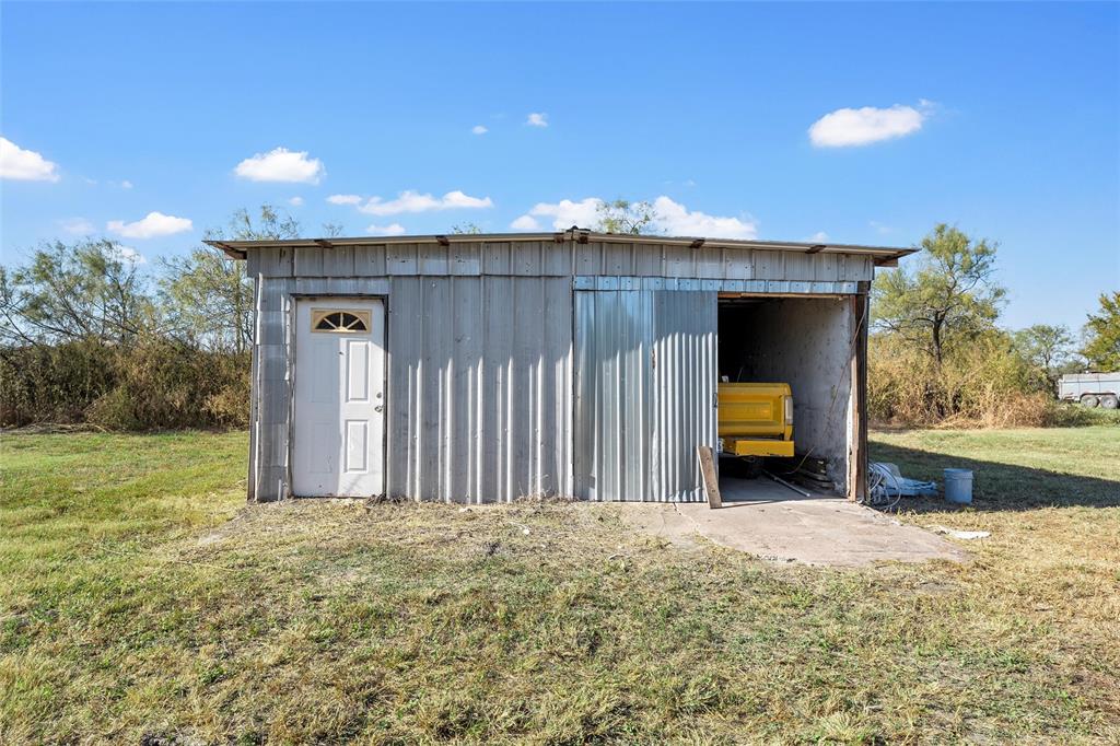 979 Old Mexia Road Waco, TX 76705 - Photo 20 of 40 a view of a room with a slide and a yard