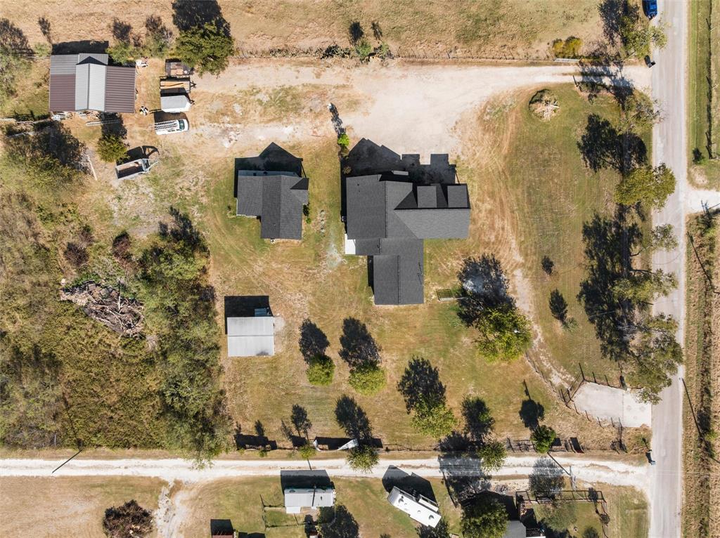 979 Old Mexia Road Waco, TX 76705 - Photo 35 of 40 an aerial view of residential houses with outdoor space