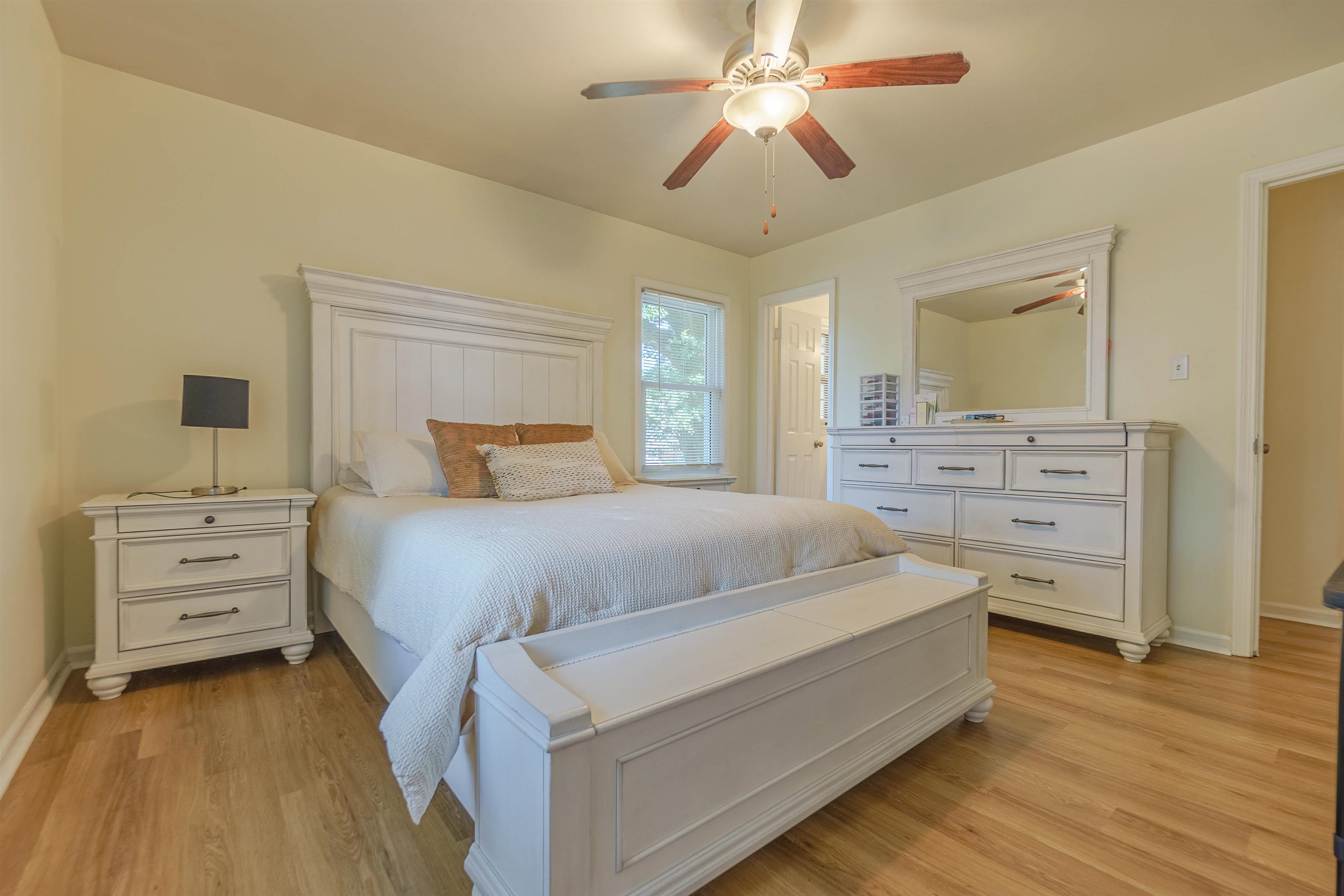 436 Clower Road Memphis, TN 38109 - Photo 18 of 22 Bedroom with light hardwood / wood-style floors and ceiling fan