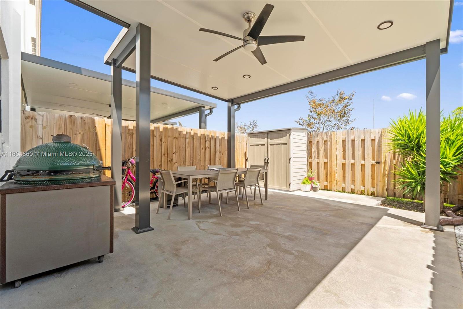 23517 Southwest 127th Place Homestead, FL 33032 - Photo 11 of 28 a living room filled with furniture and a large window