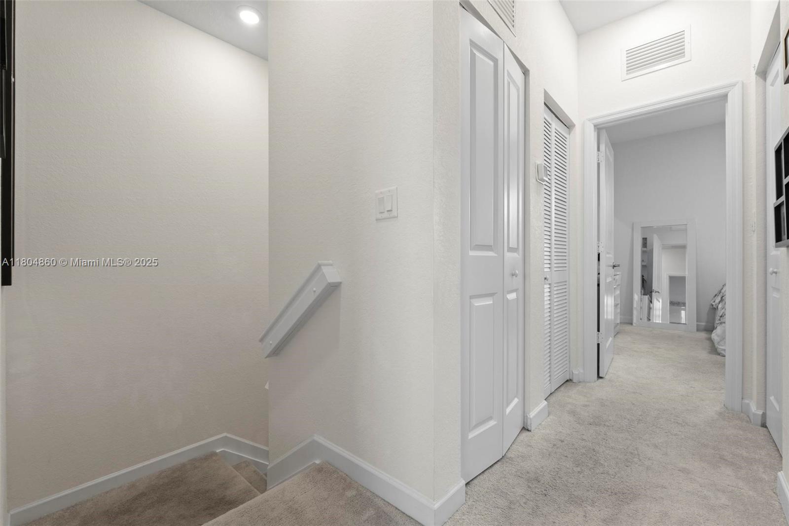 23517 Southwest 127th Place Homestead, FL 33032 - Photo 13 of 28 a view of hallway with an empty room