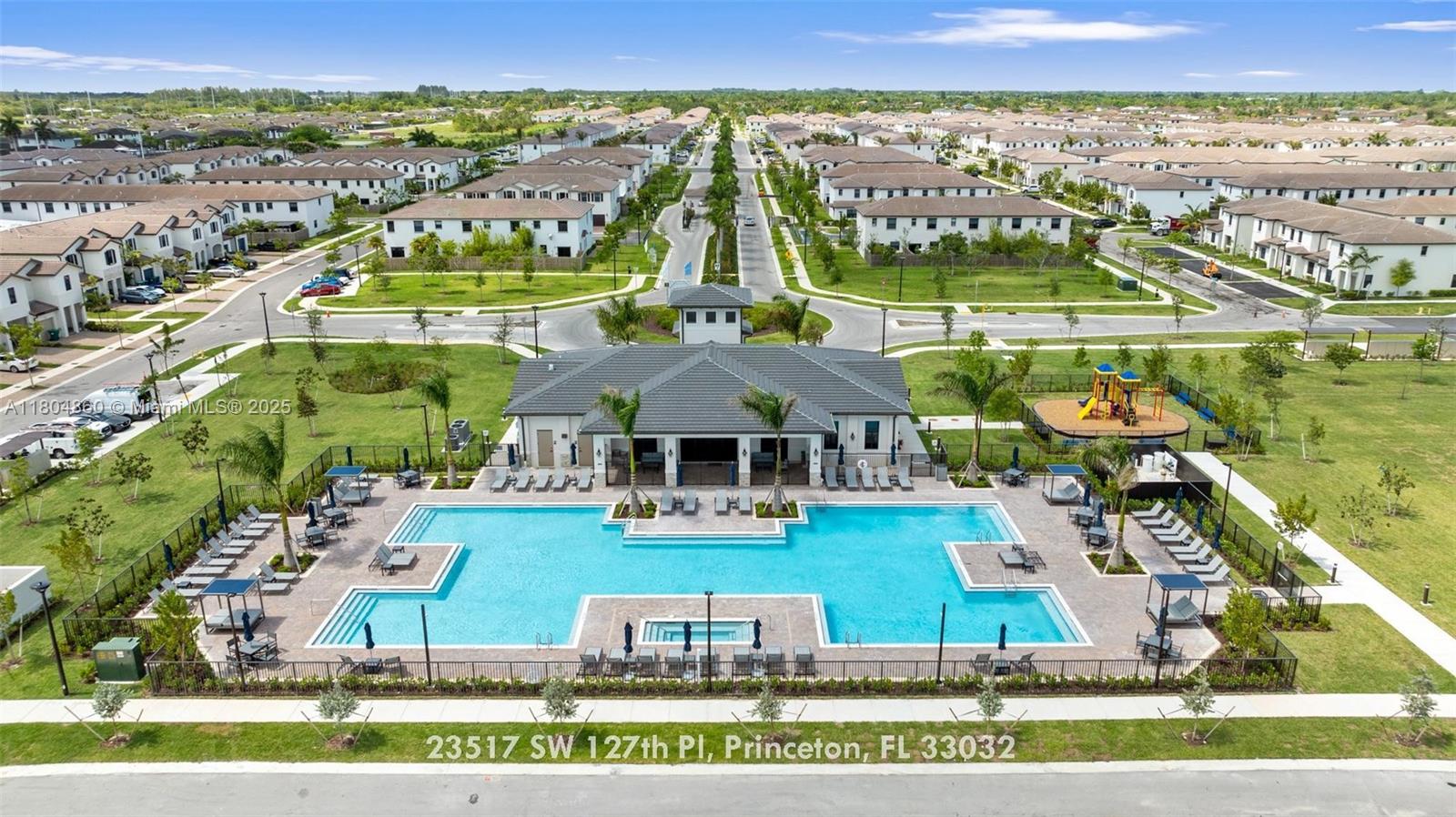23517 Southwest 127th Place Homestead, FL 33032 - Photo 21 of 28 an aerial view of residential houses with outdoor space and ocean view