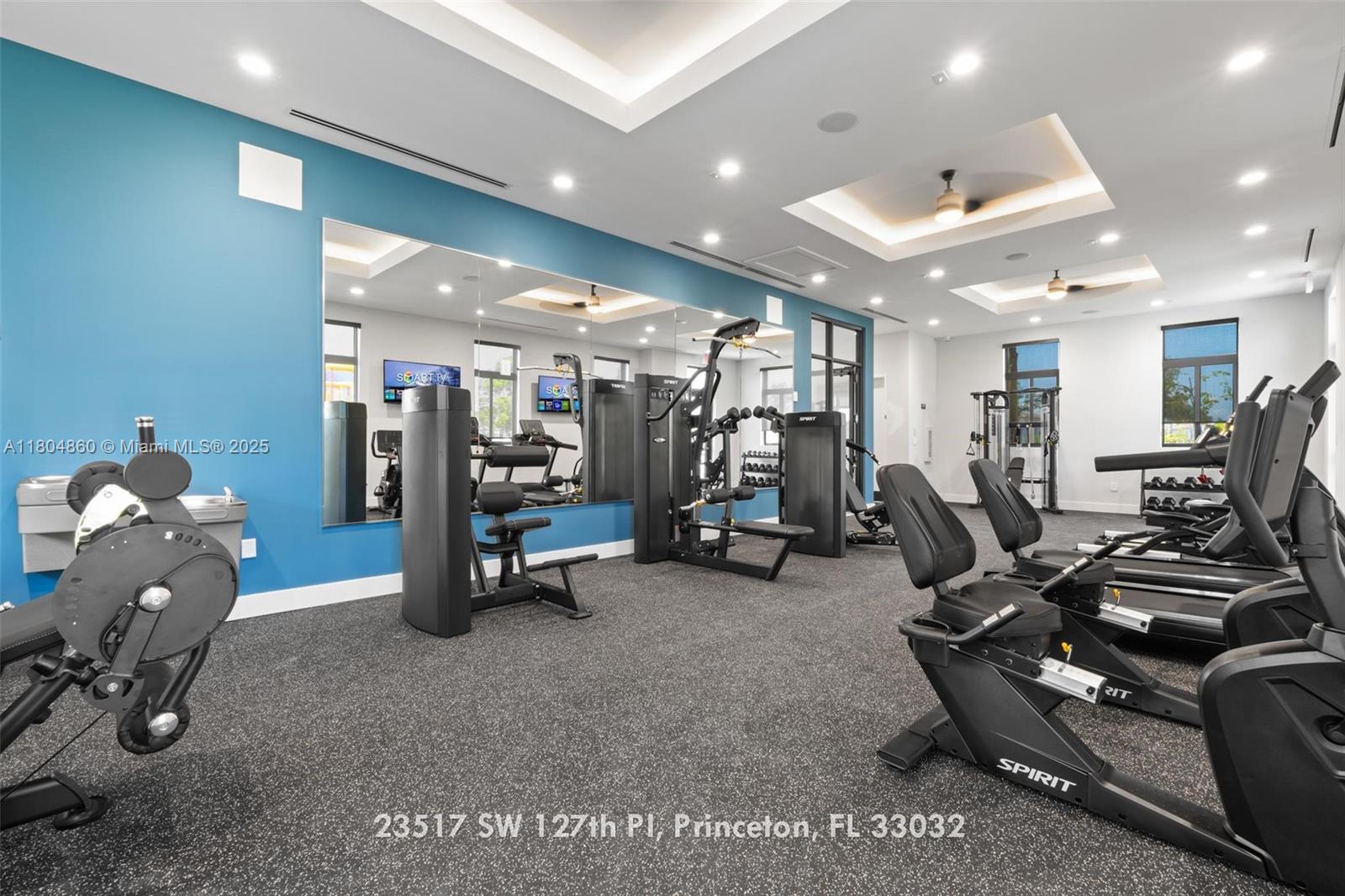 23517 Southwest 127th Place Homestead, FL 33032 - Photo 23 of 28 a view of a room with gym equipment