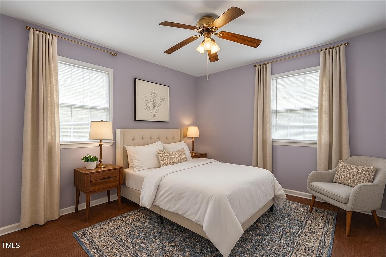 1813 Grady Drive Durham, NC 27712 - Photo 12 of 32 a bedroom with a bed a couch and a window