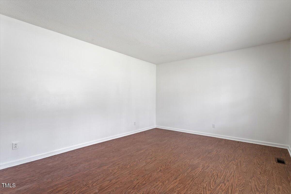1813 Grady Drive Durham, NC 27712 - Photo 21 of 32 a view of an empty room