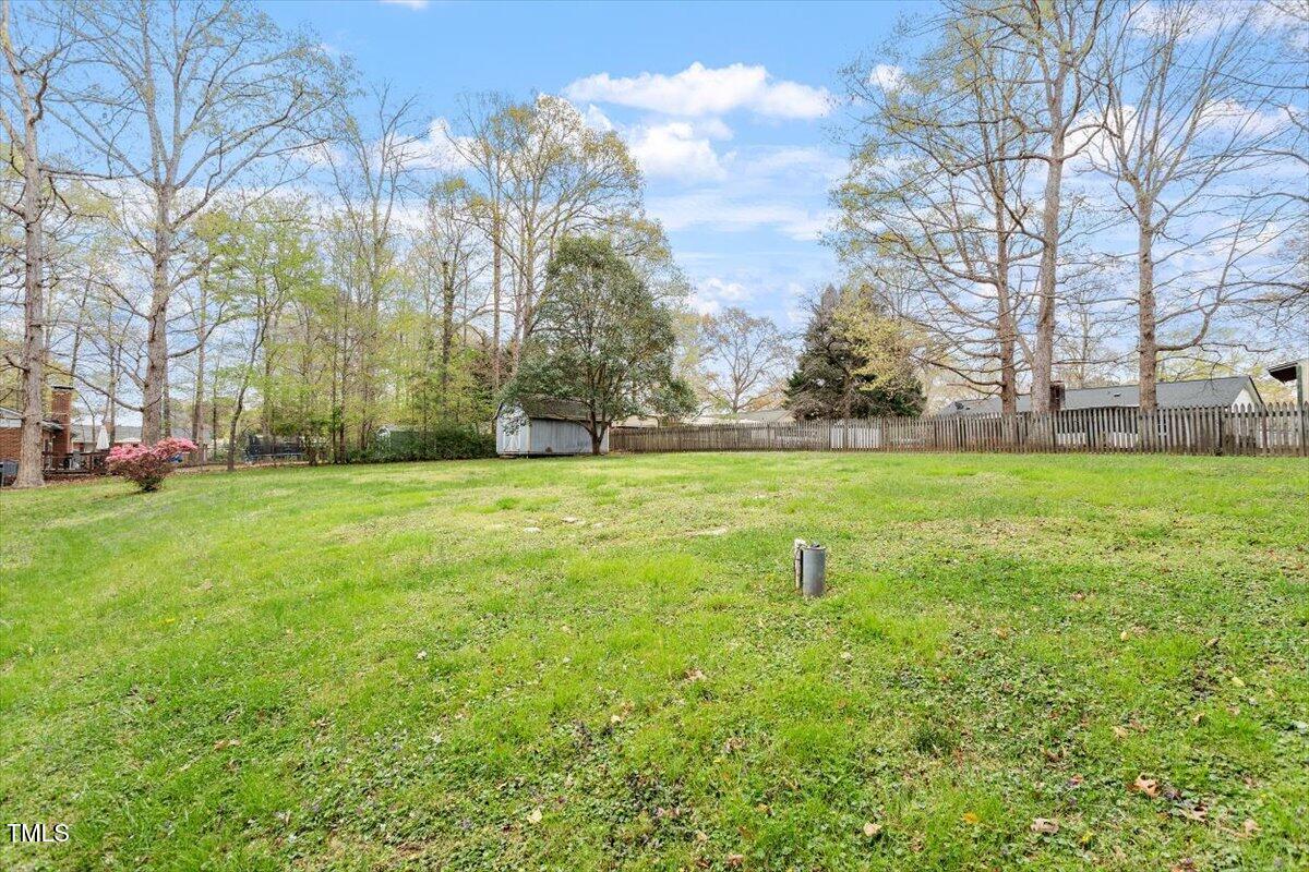 1813 Grady Drive Durham, NC 27712 - Photo 22 of 32 a view of a park with large trees