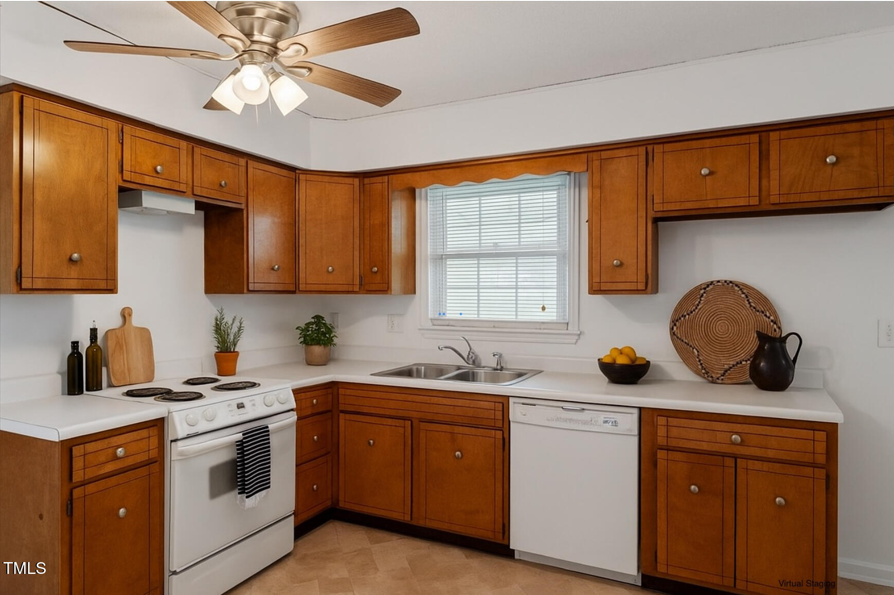 1813 Grady Drive Durham, NC 27712 - Photo 25 of 32 a kitchen with stainless steel appliances a sink stove and cabinets