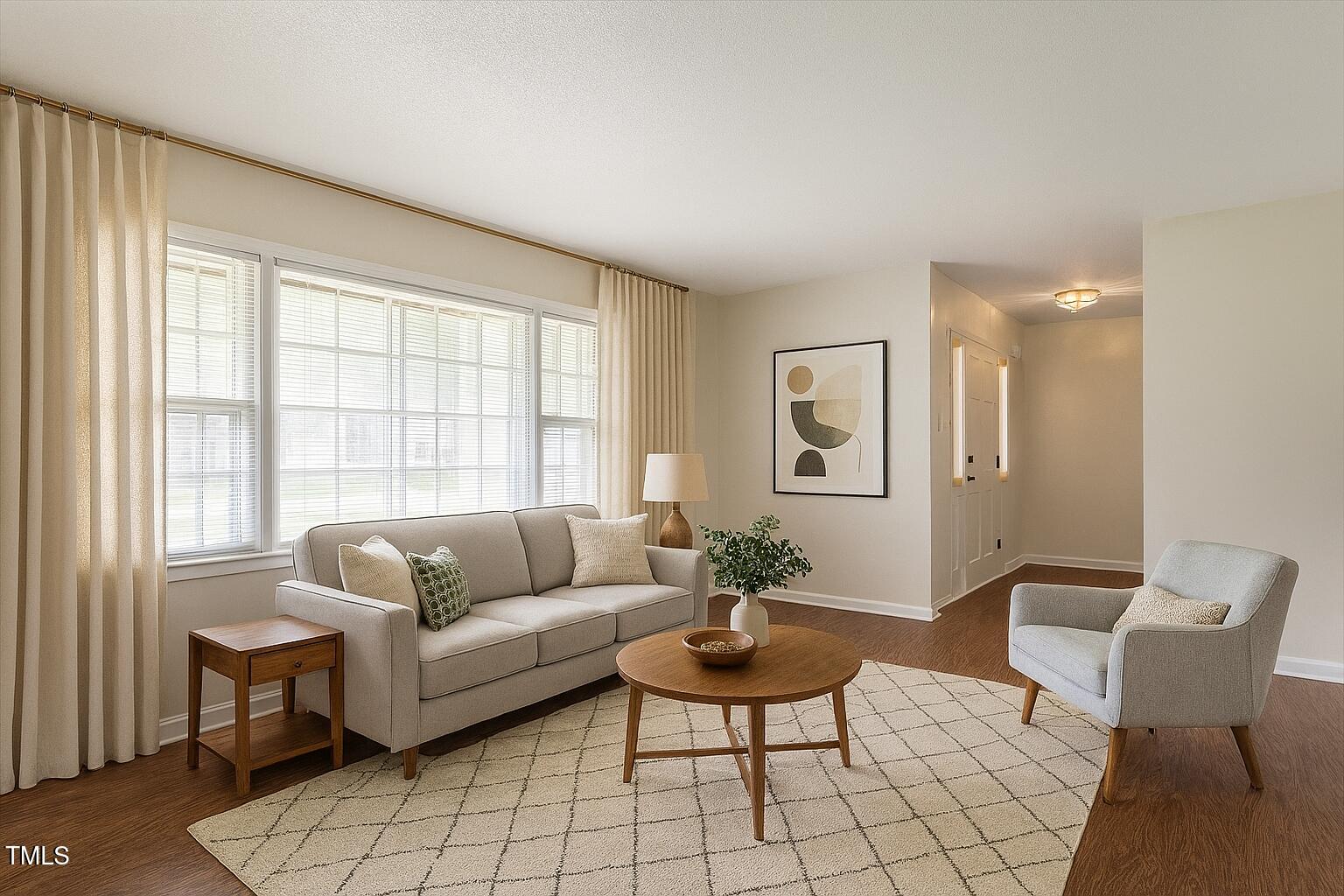 1813 Grady Drive Durham, NC 27712 - Photo 6 of 32 a living room with furniture and a large window