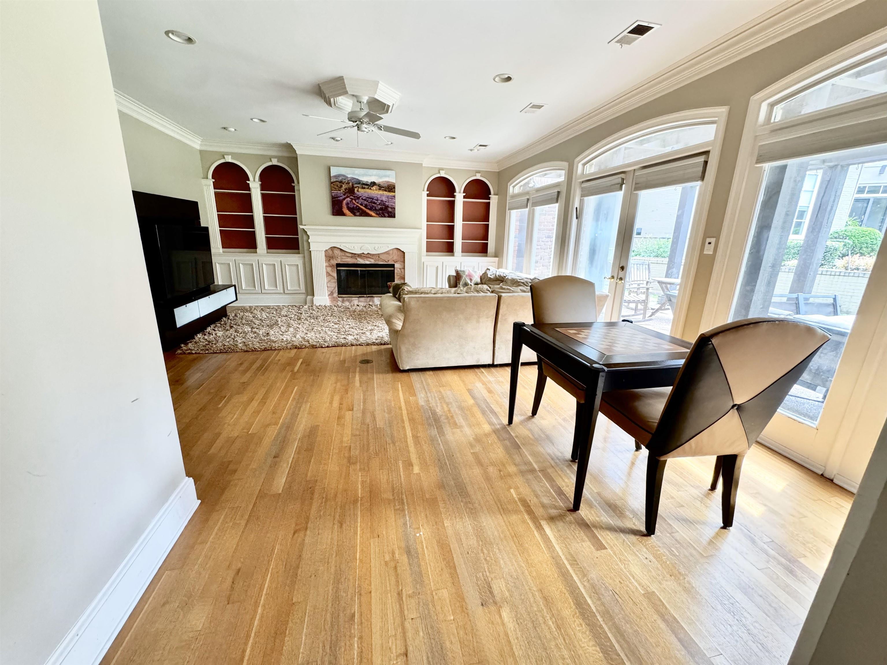 415 South Yates Road Memphis, TN 38120 - Photo 13 of 30 a living room with furniture and a fireplace