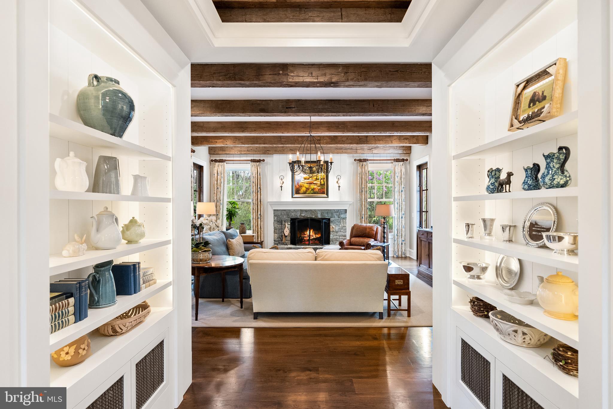 6529 Sothoron Road McLean, VA 22101 - Photo 12 of 103 A wood-burning fireplace anchors the family room