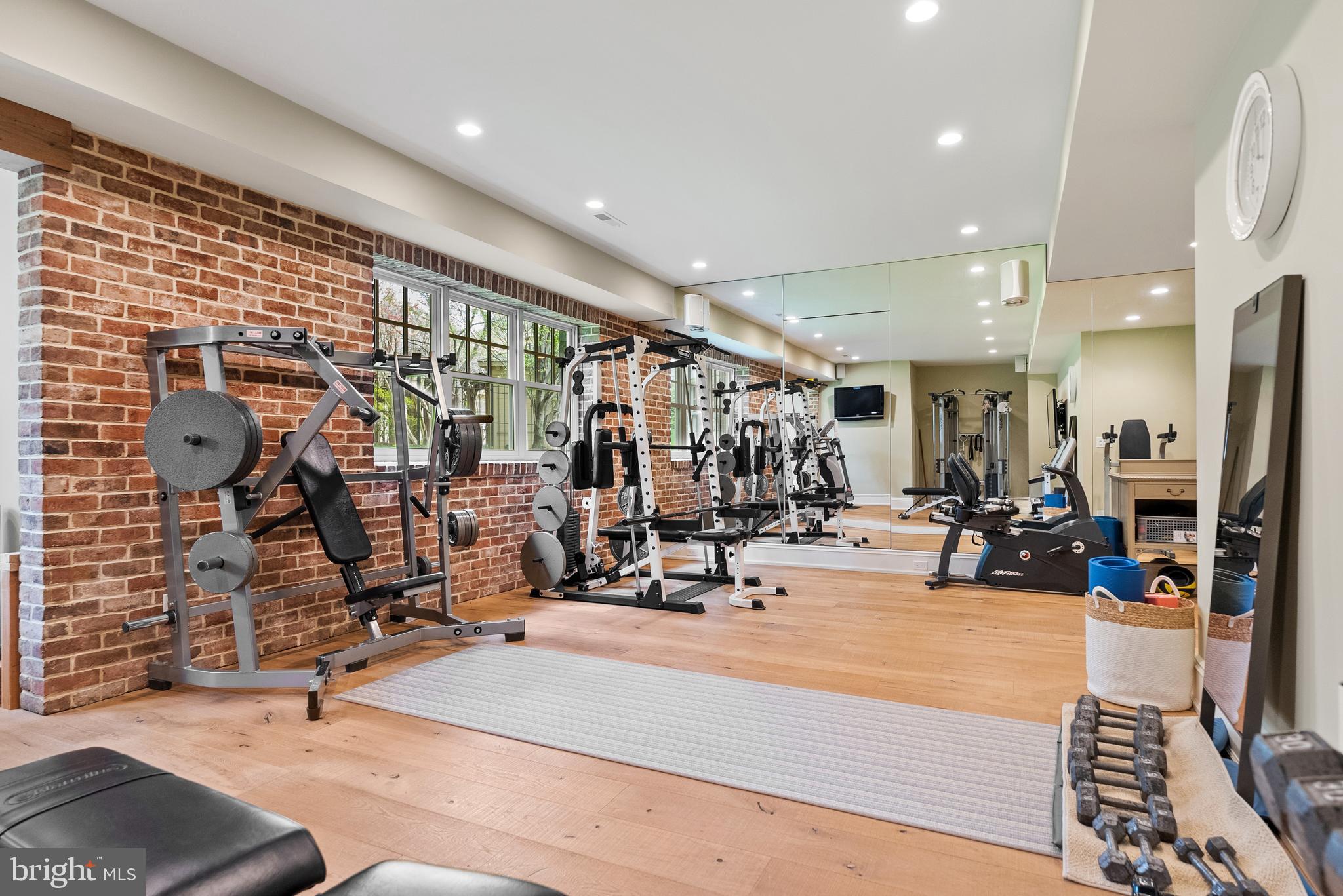 6529 Sothoron Road McLean, VA 22101 - Photo 64 of 103 Expansive gym with windows and exposed brick