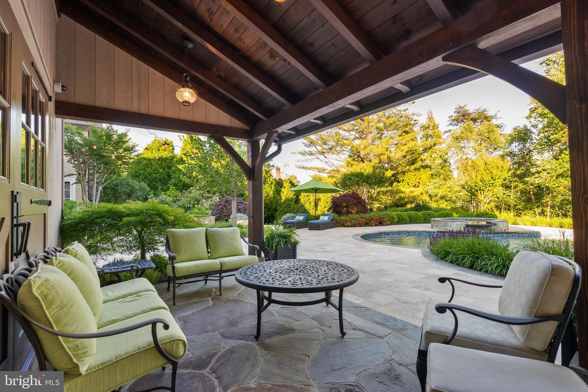 6529 Sothoron Road McLean, VA 22101 - Photo 84 of 103 A covered porch on the annex overlooks the pool