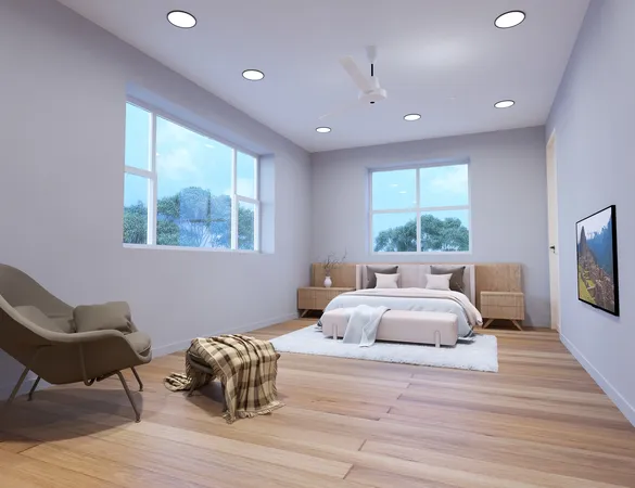a bedroom with furniture and a large window