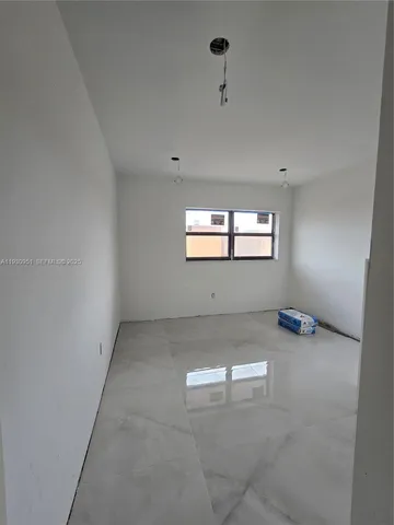 a bathroom with a tub and a shower