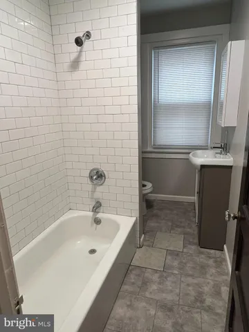 a bathroom with a bathtub