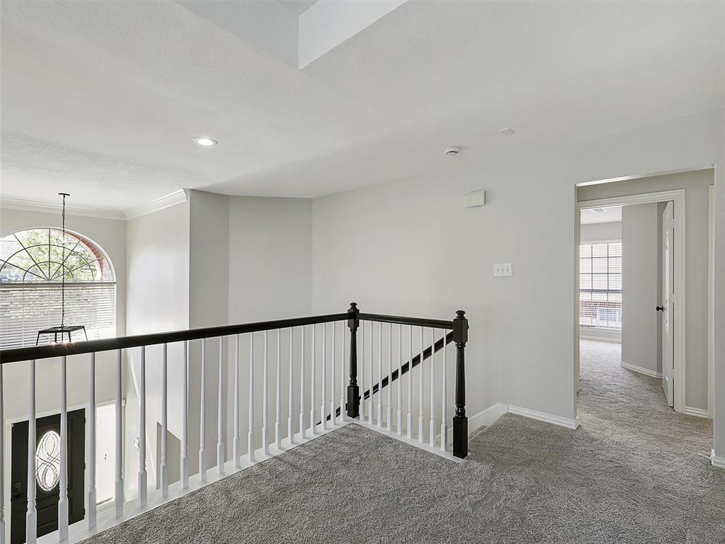 7612 Pendleton Street Dallas, TX 75252 - Photo 25 of 38 a view of staircase with rug floor