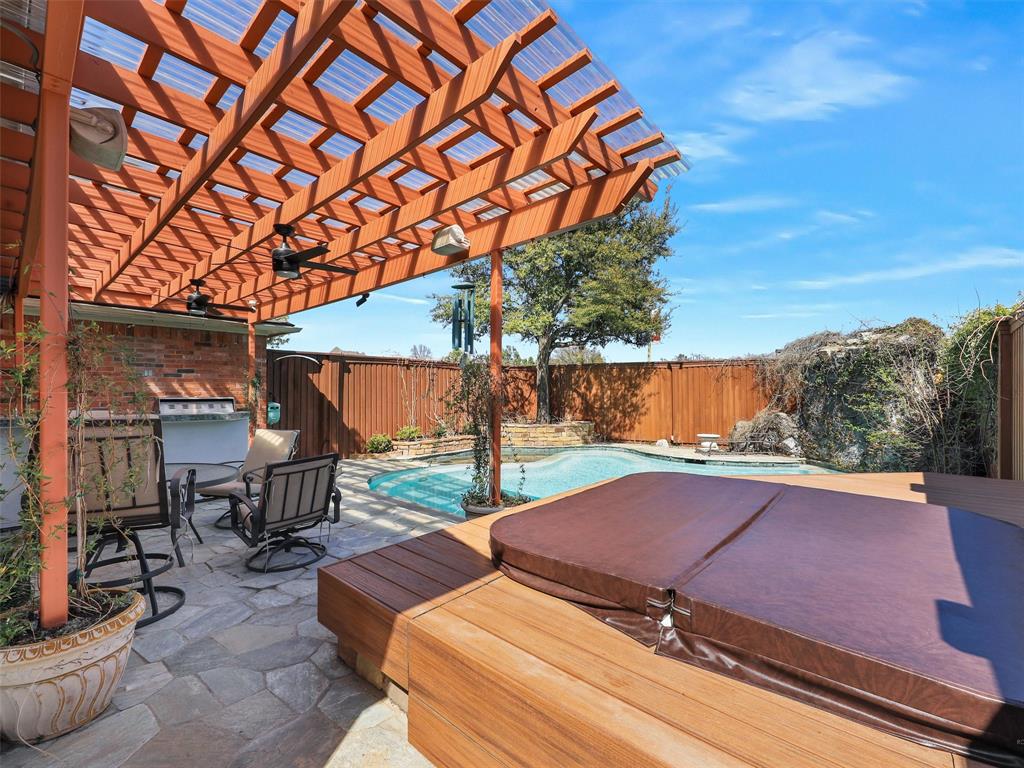 7612 Pendleton Street Dallas, TX 75252 - Photo 34 of 38 a view of a backyard with sitting area