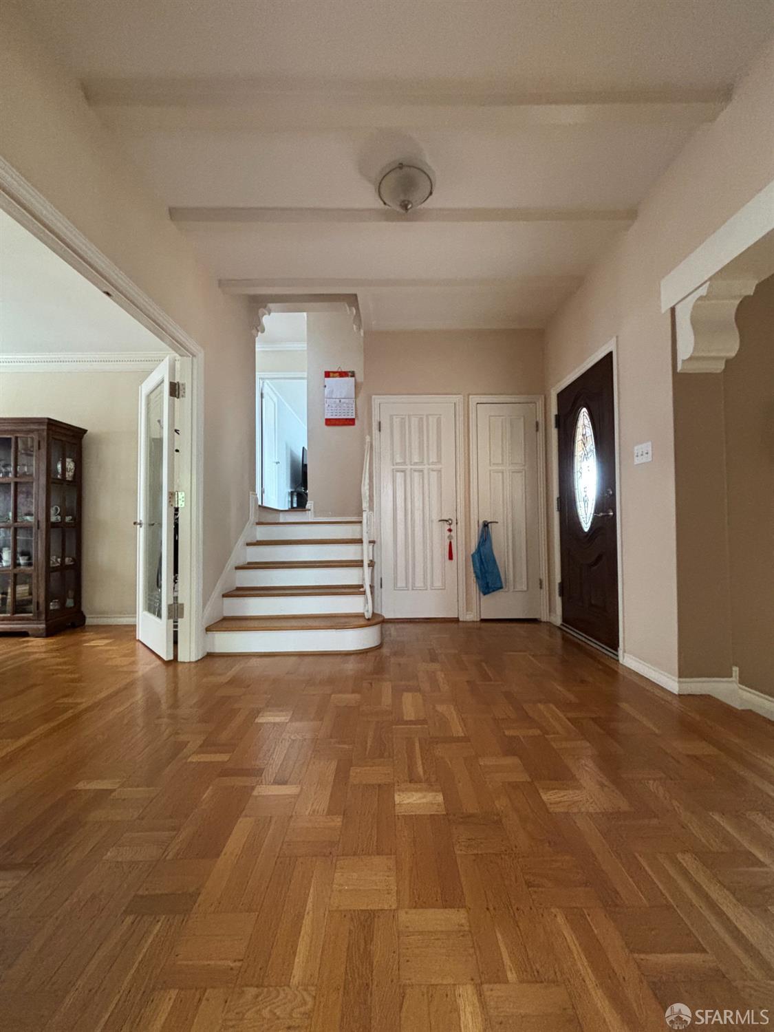 450 Laurel Avenue Millbrae, CA 94030 - Photo 14 of 27 a view of a livingroom with wooden floor and a fireplace