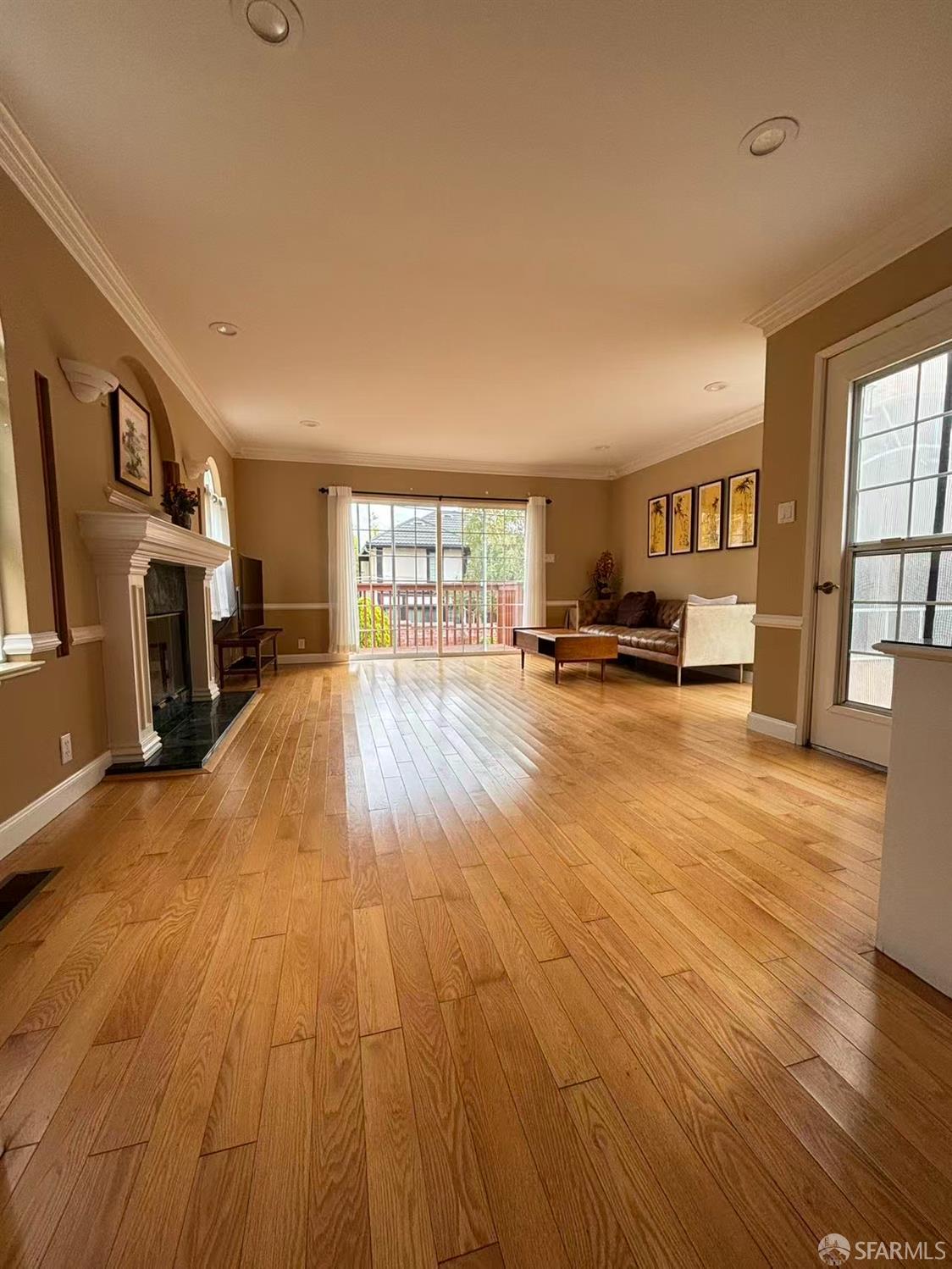 450 Laurel Avenue Millbrae, CA 94030 - Photo 20 of 27 wooden floor in an empty room with a fireplace