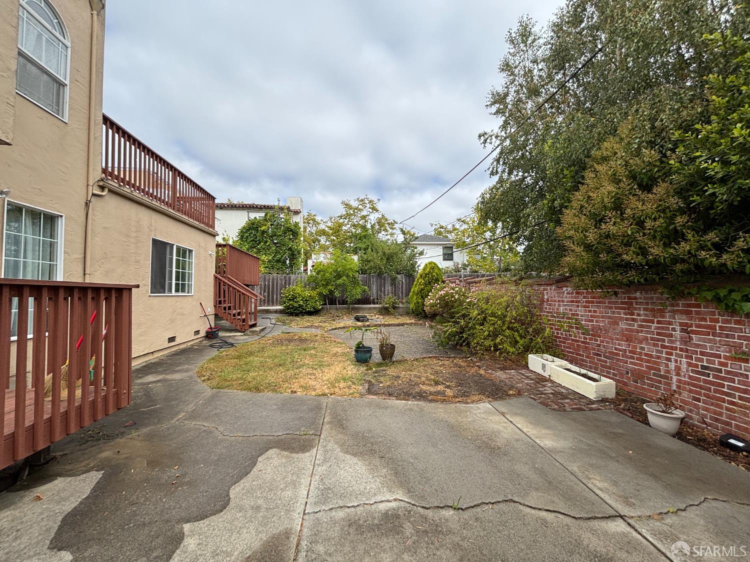450 Laurel Avenue Millbrae, CA 94030 - Photo 5 of 27 a view of a house with backyard and sitting area