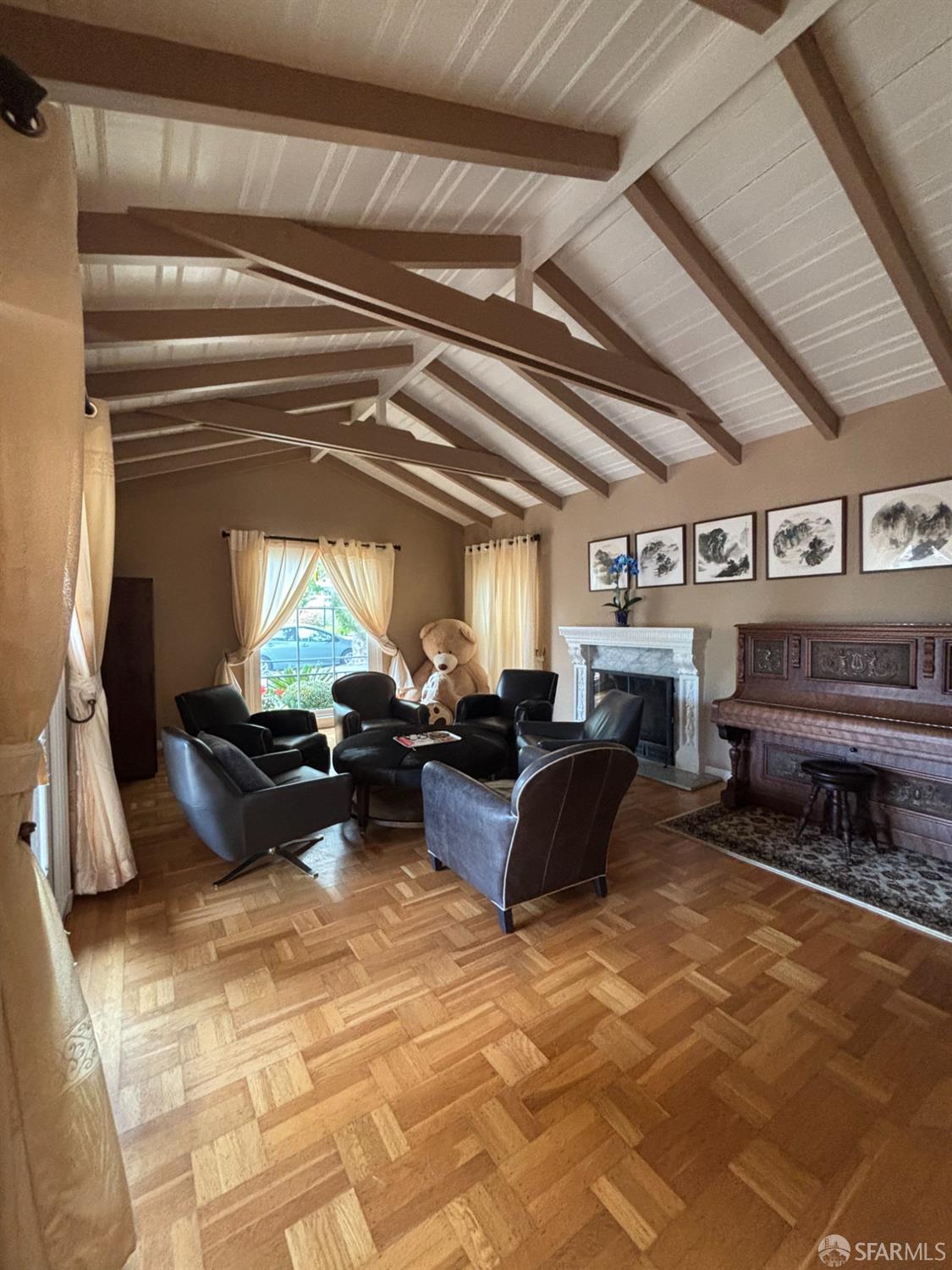 450 Laurel Avenue Millbrae, CA 94030 - Photo 9 of 27 a living room with furniture and a piano