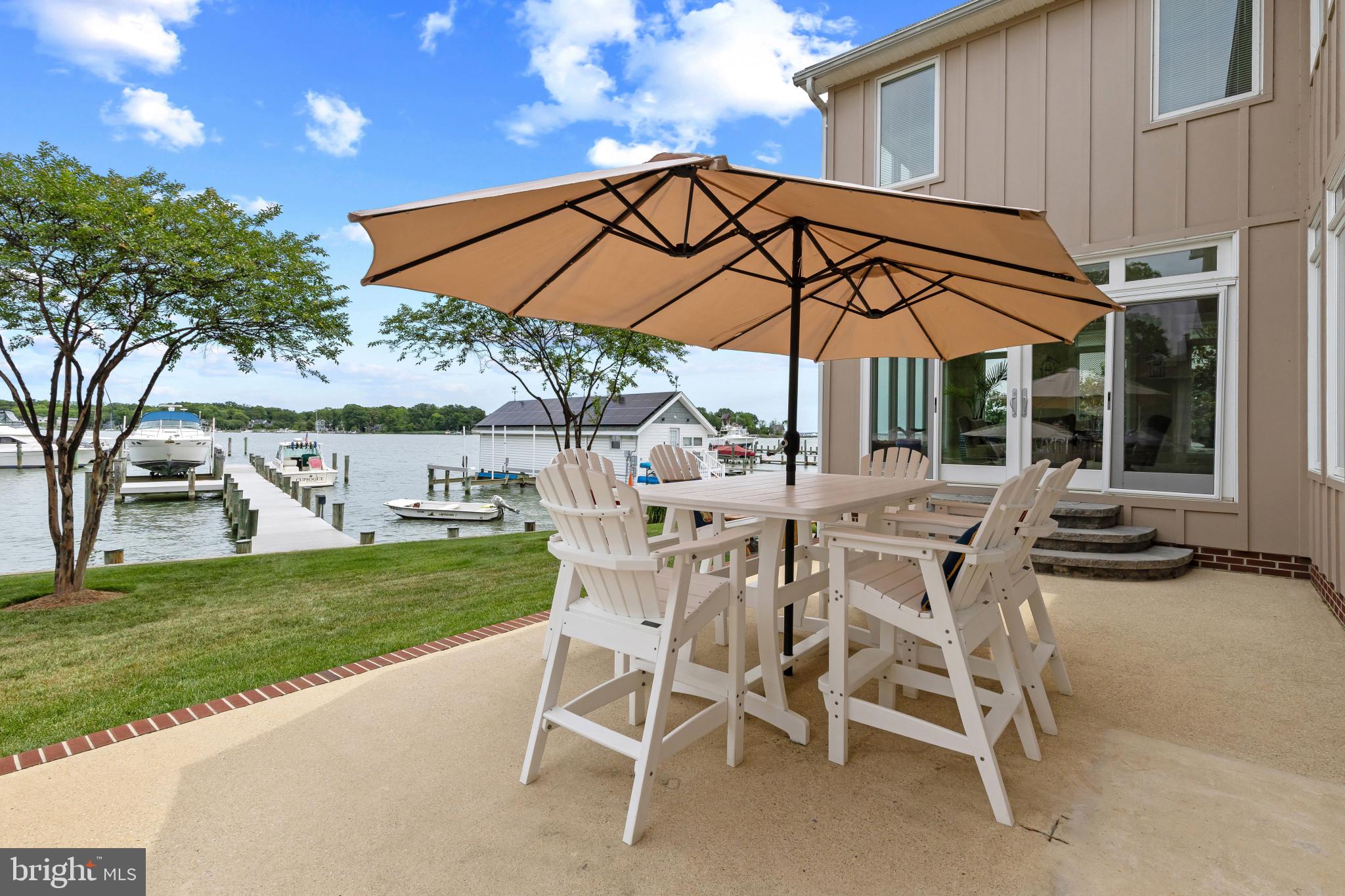 3733 Thomas Point Road Annapolis, MD 21403 - Photo 19 of 46 Patio off the sunroom