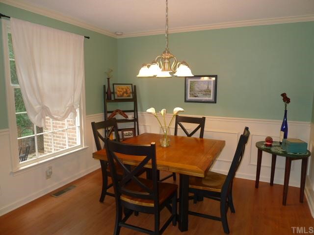 2901 Wycliff Road Raleigh, NC 27607 - Photo 3 of 10 a view of a dining room with furniture and window
