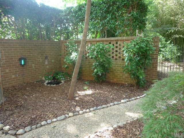 2901 Wycliff Road Raleigh, NC 27607 - Photo 10 of 10 a backyard of a house with lots of green space
