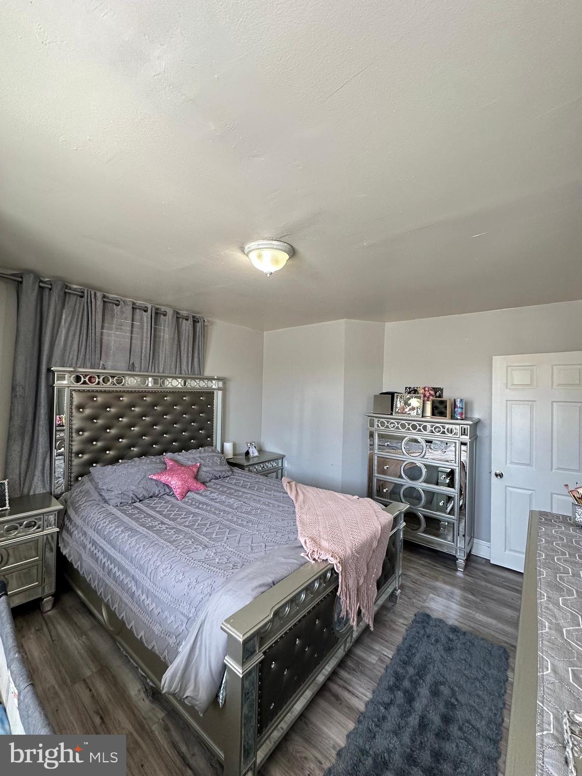 4914 Ormes Street Philadelphia, PA 19120 - Photo 16 of 33 a bedroom with a bed and a view kitchen