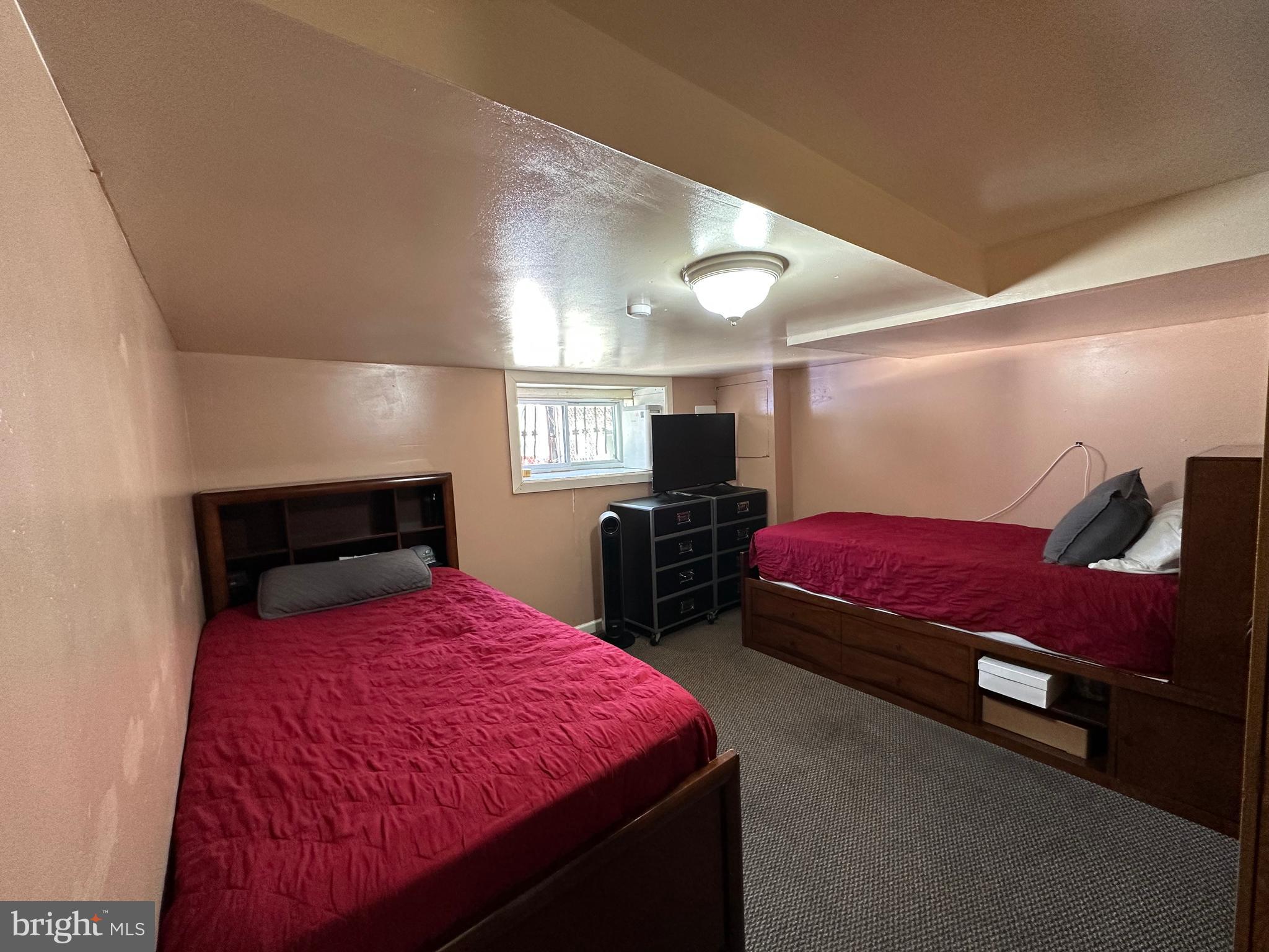 4914 Ormes Street Philadelphia, PA 19120 - Photo 21 of 33 a bed room with a bed and a night stand