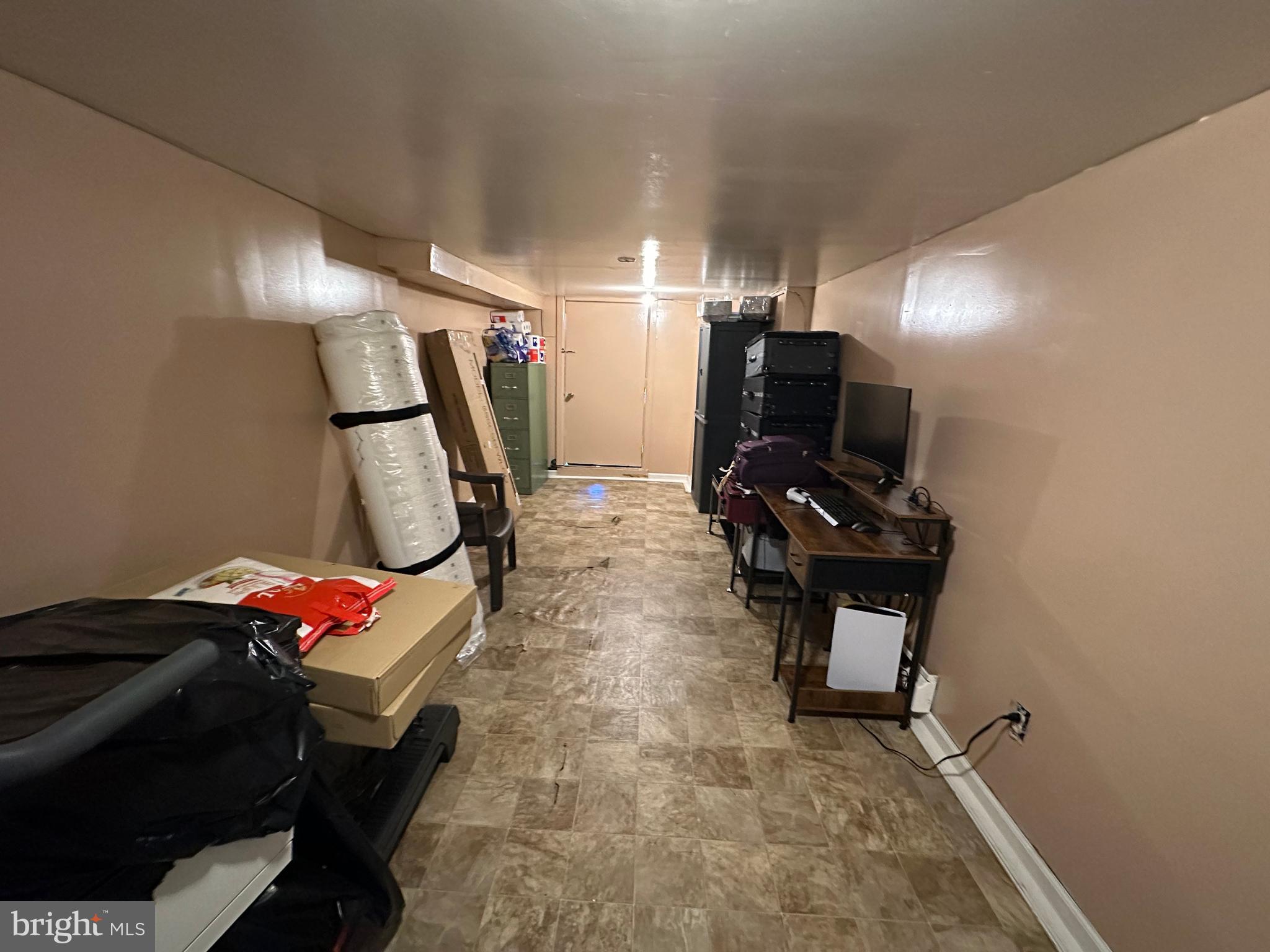 4914 Ormes Street Philadelphia, PA 19120 - Photo 30 of 33 a room with furniture and gym equipment