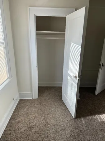 a bathroom with a toilet and a sink