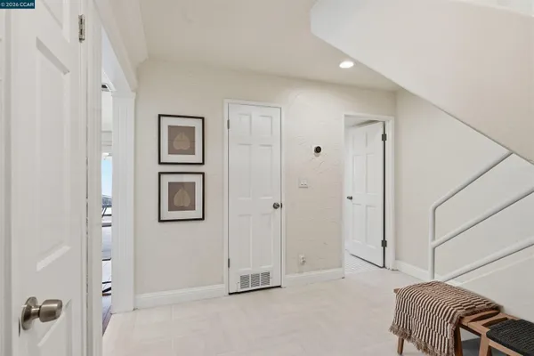 a bed room with a bed and a window