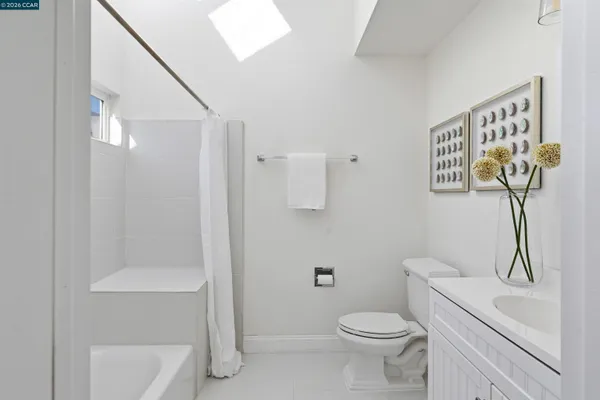 a bathroom with a sink and vanity