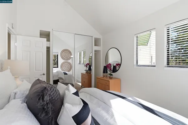 a bathroom with a sink vanity and a mirror