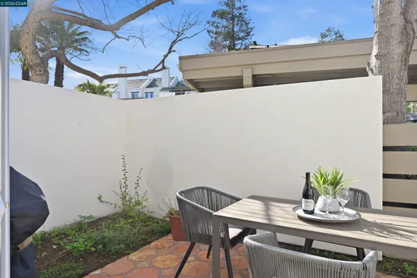 a view of park with bench and trees