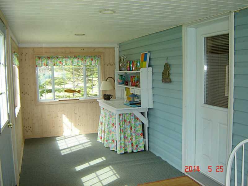 738 Beaulieu Road St. David, ME 04773 - Photo 17 of 33 Sunroom. Side Enclosed Porch