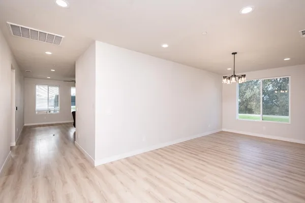 a view of livingroom with hardwood floor and window
