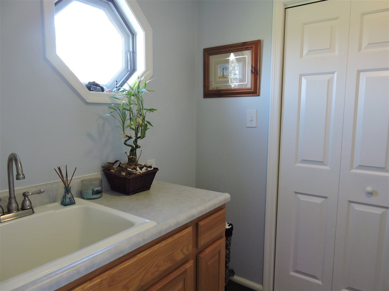 123 Cricket Road Staunton, VA 24401 - Photo 33 of 49 a bathroom with a sink and a mirror